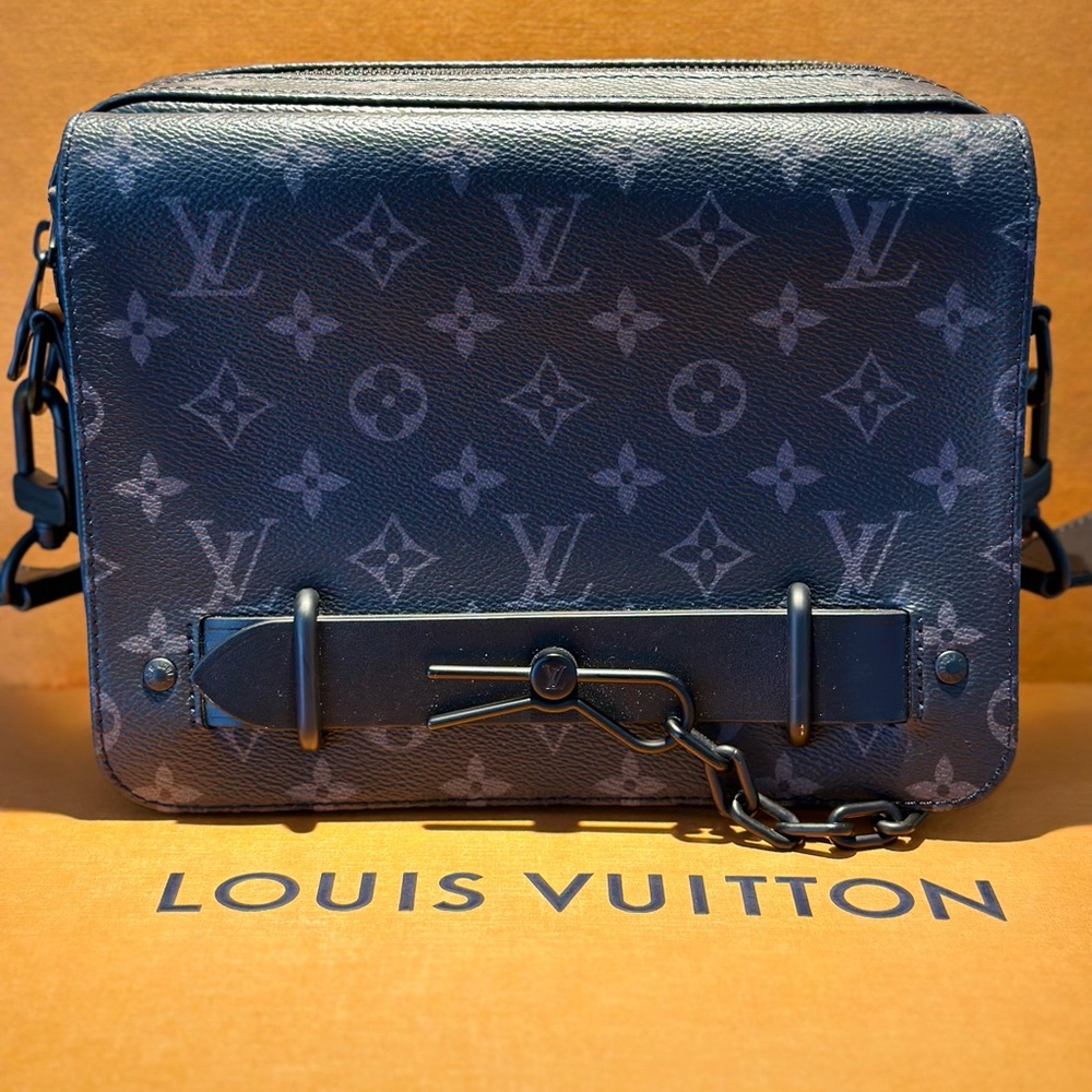 Louis Vuitton Steamer Monogram Eclipse Messenger Bag W/box and dust bag.